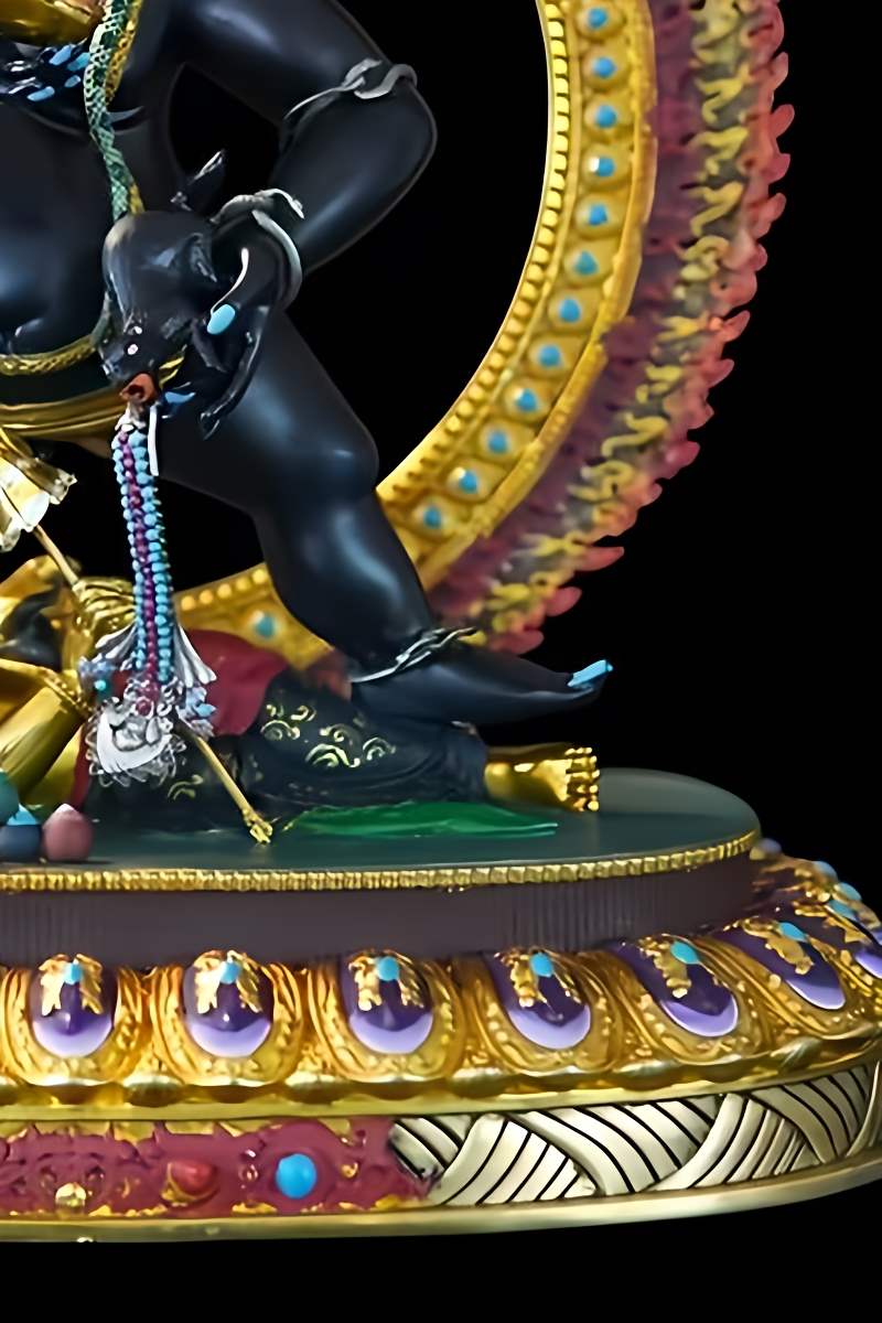 Sacred Tibetan Buddhist wealth god sculpture of Black Jambhala, handmade from copper, reflecting the spiritual significance and artistry of Buddhist statue culture.
