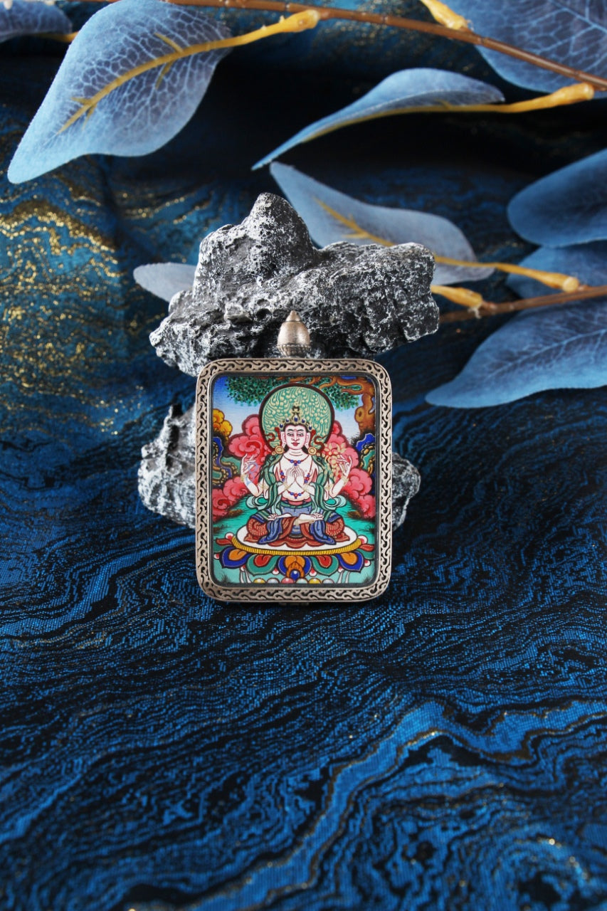 Detailed close-up of the Four-Armed Avalokiteshvara Thangka core, highlighting the prayer mudra, crystal mala, and the artist's fine gold-line work.