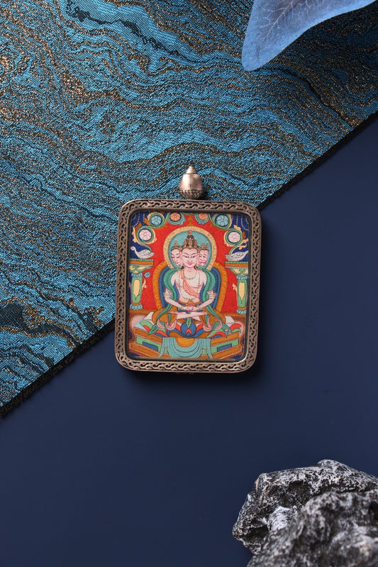 Close-up of the Vairocana Thangka, showing the intricate multi-faced deity painted with Tibetan natural mineral pigments.