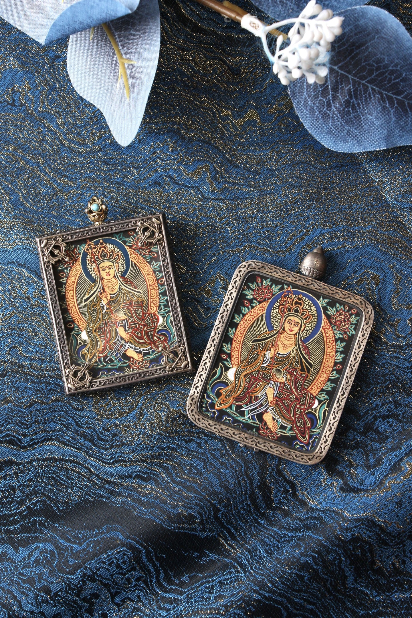 3.5x4.5cm portable Kshitigarbha Thangka amulet, showcasing the fluid lines and high-quality mineral pigments.