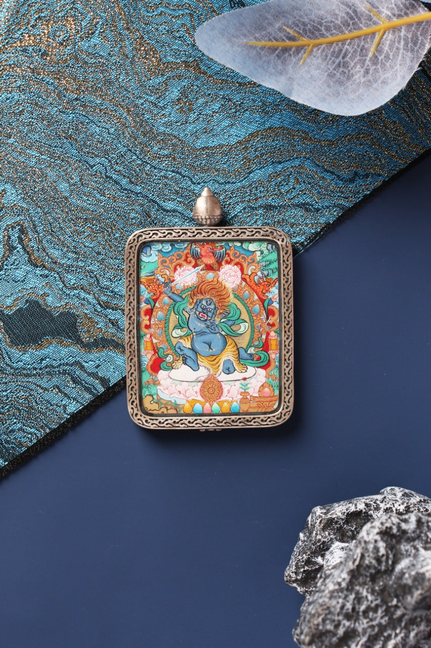 Close-up of the Acala Thangka core, showcasing the intense wrathful features and natural mineral pigments used by Tibetan masters.