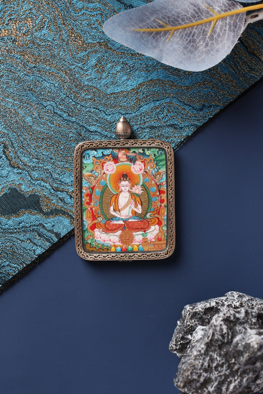 Macro view of the Mahasthamaprapta Thangka core, showing the serene facial features and exquisite mineral pigment details.