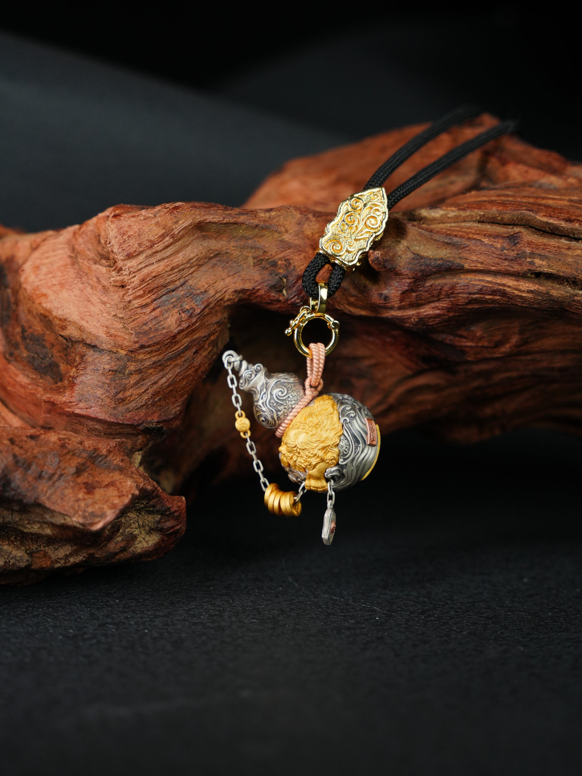 Artisan-crafted 24K gold-plated silver Hulu talisman inspired by sacrificial implements culture, symbolizing wealth and exorcism.