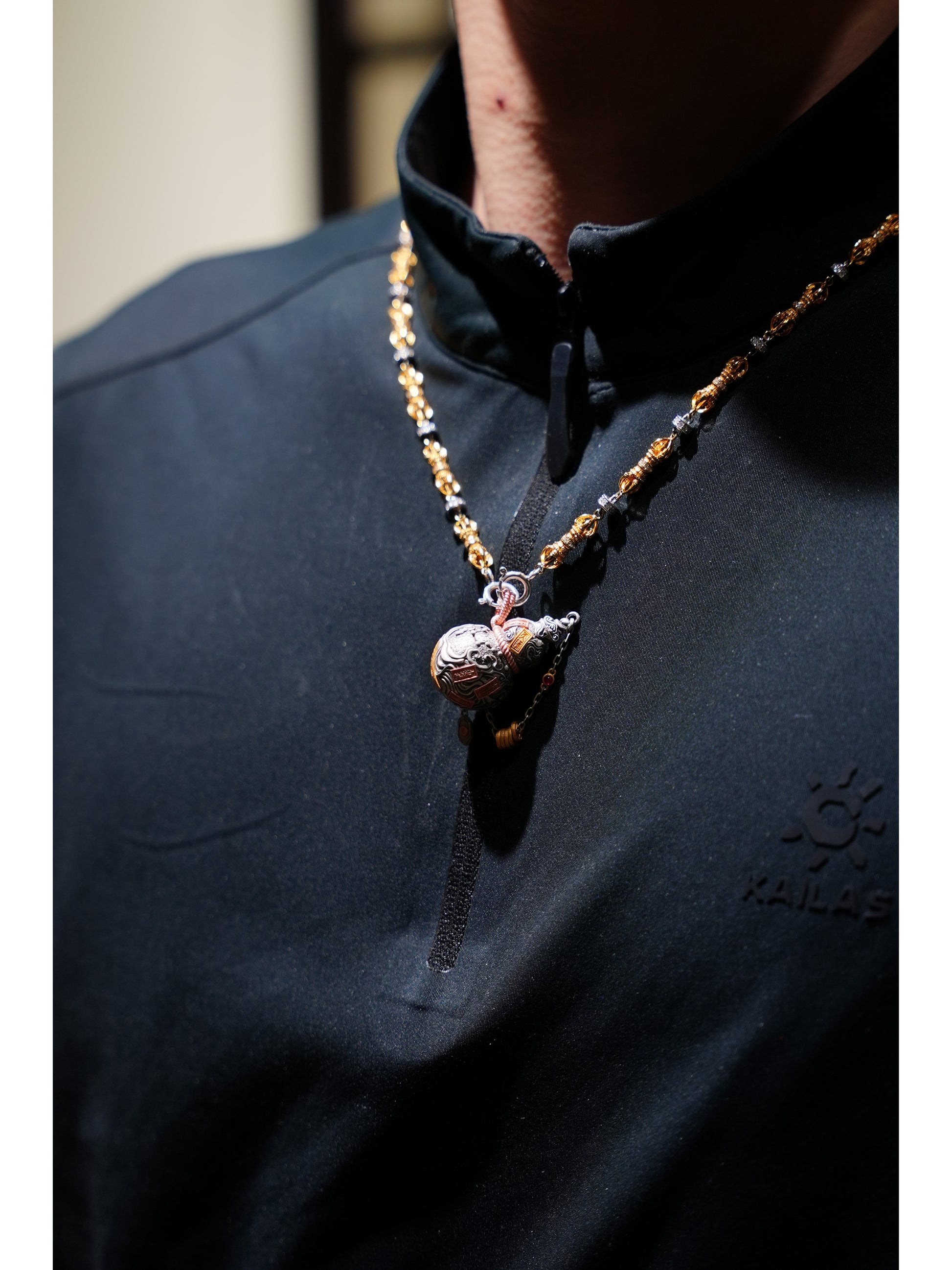 A practitioner wearing the sacred Five Thunders Gourd necklace for dispelling negative energy, representing sacrificial items art.