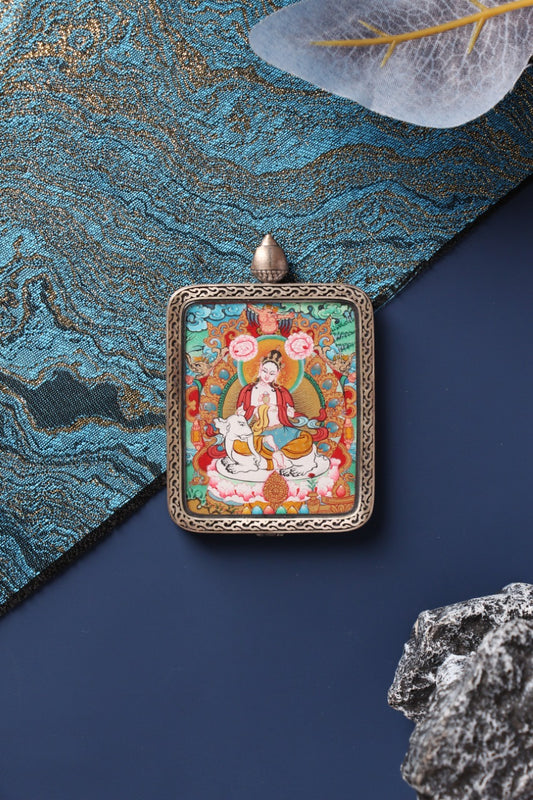 The Samantabhadra Bodhisattva Thangka pendant, the spiritual guardian for those born in the Year of the Dragon and Snake.