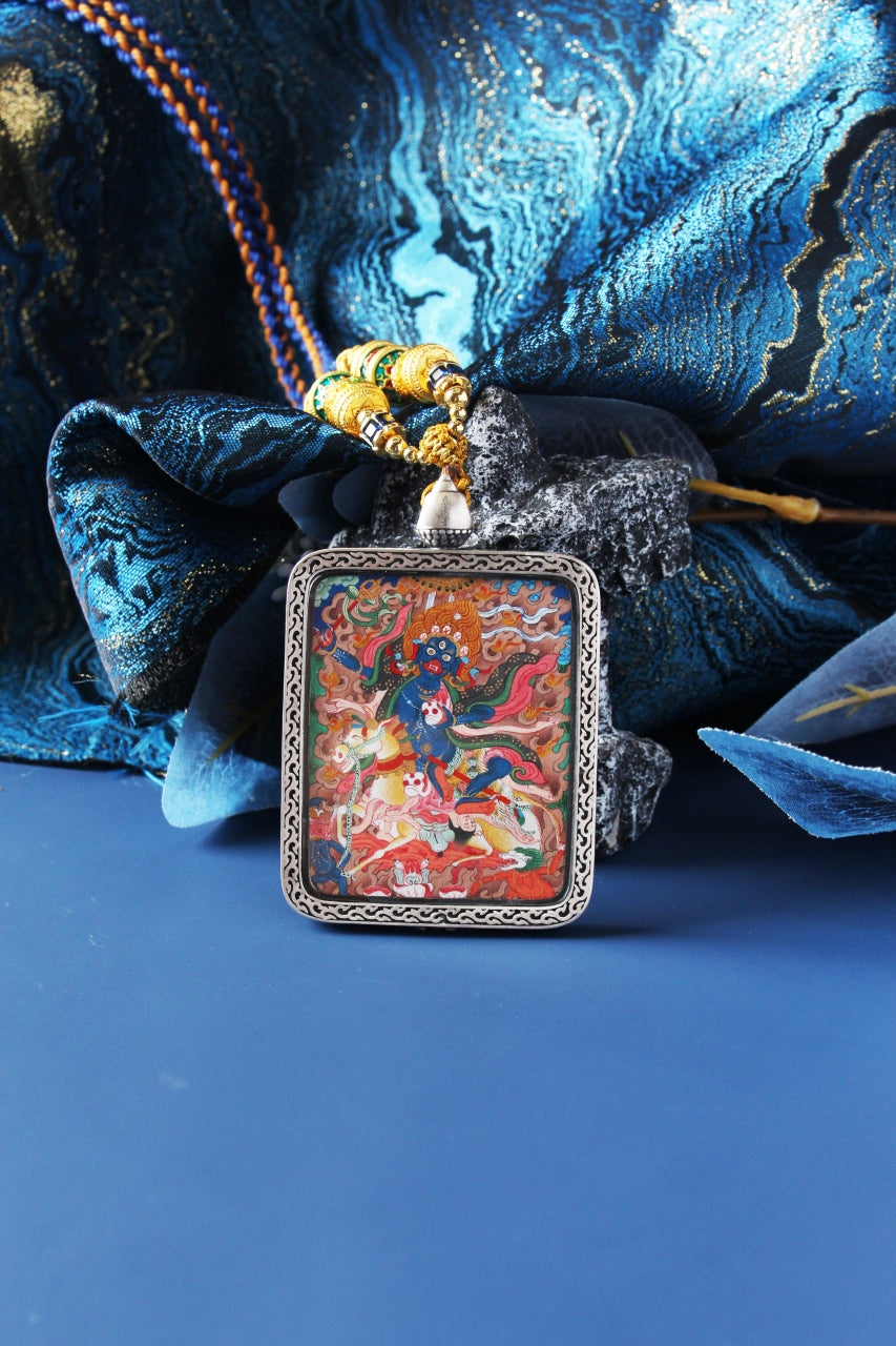 Hand-painted Tibetan Thangka pendants paired with traditional bead necklaces for spiritual protection and wealth.