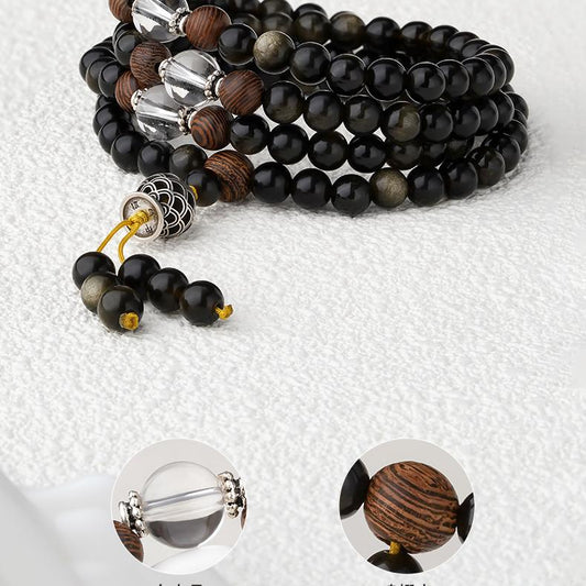 Handmade Tibetan Buddhist golden obsidian 108 mala with white crystal and wenge wood accents for meditation and spiritual practice.