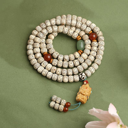 Handmade Tibetan Buddhist Xiangxie Starry Moon Bodhi 108 mala with chalcedony, olive nut and copper beads, inspired by Tibetan thangka art.