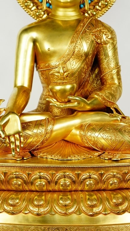 A handcrafted Tibetan Buddhist statue of the Three Buddhas, gilded with mineral paint, showcasing exquisite craftsmanship in Tibetan Buddhist art.