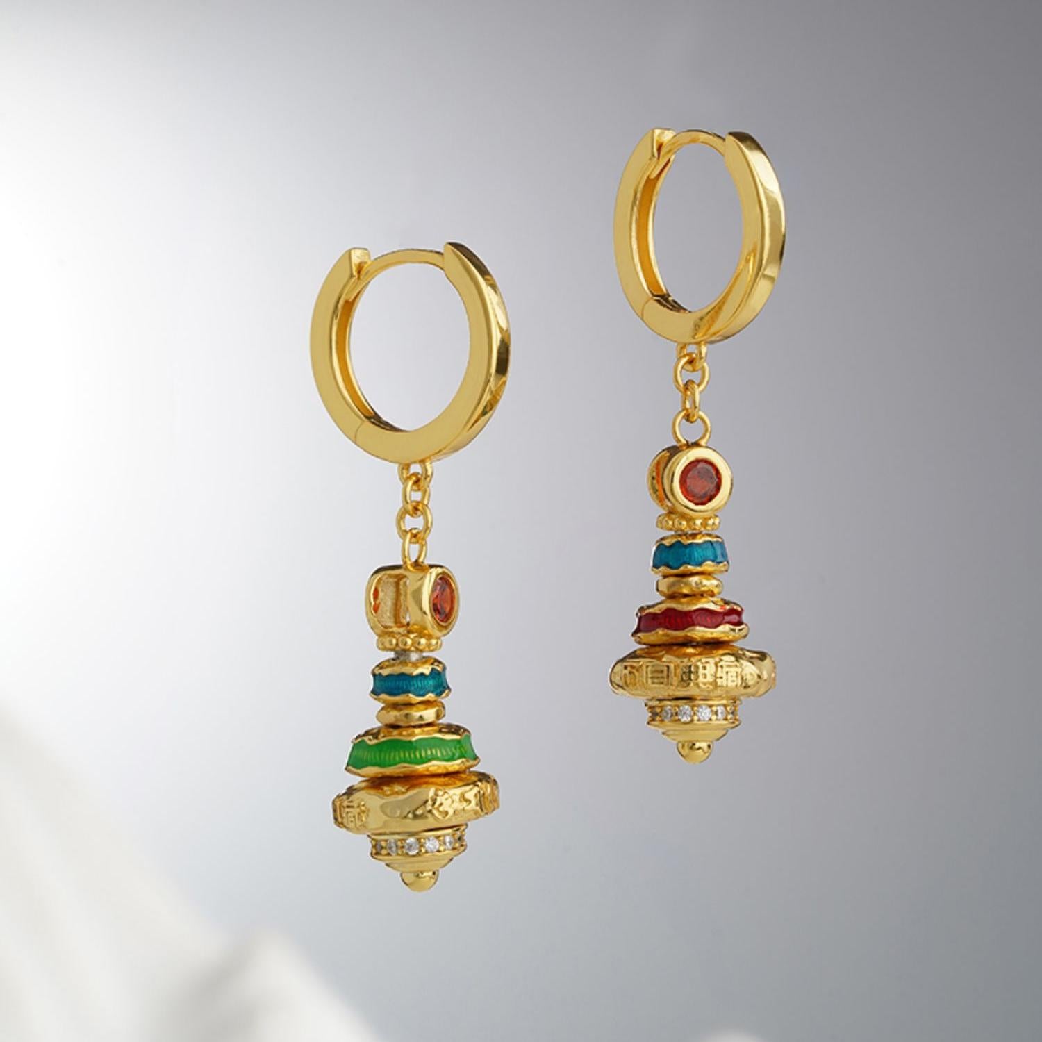 Handmade Tibetan Buddhist 925 silver earrings symbolizing purity and wholeness.