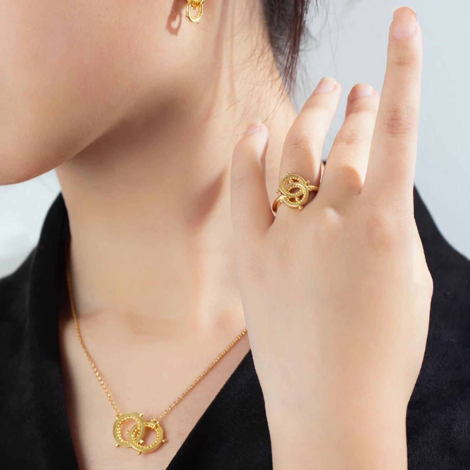 "Artisan-crafted 925 silver ring with gold plating, featuring a mountain-water design symbolizing mutual support and connection."