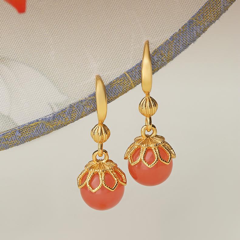 "Artisan-crafted South Red Coral ear pendants in 925 silver, symbolizing clarity, peace, and spiritual purity."