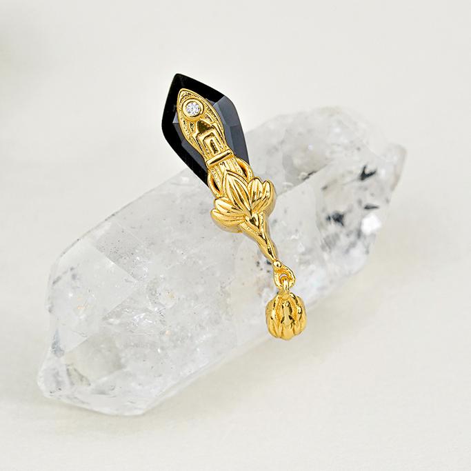 "Tibetan Buddhist-inspired 925 silver ear studs with black agate, representing the sword of wisdom and spiritual protection."