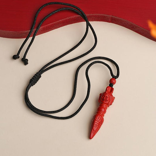 Handcrafted Qi Tian Le cinnabar pendant, 49mm, with Buddhist art.