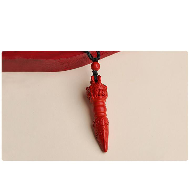 Spiritual Qi Tian Le cinnabar pendant, handcrafted with Tibetan Buddhist significance.
