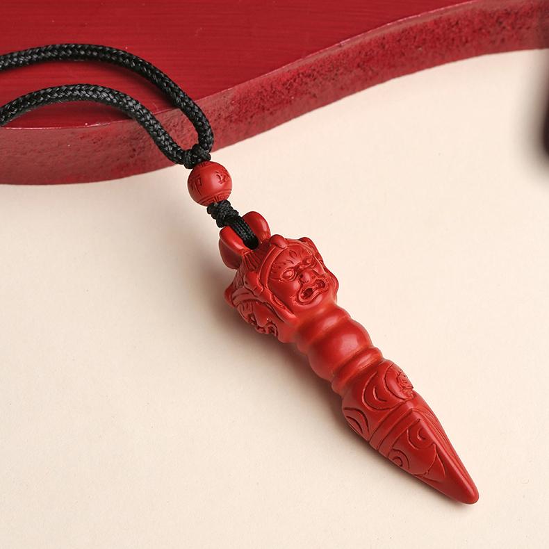 Pure cinnabar pendant with Buddhist symbolism and handmade artistry.