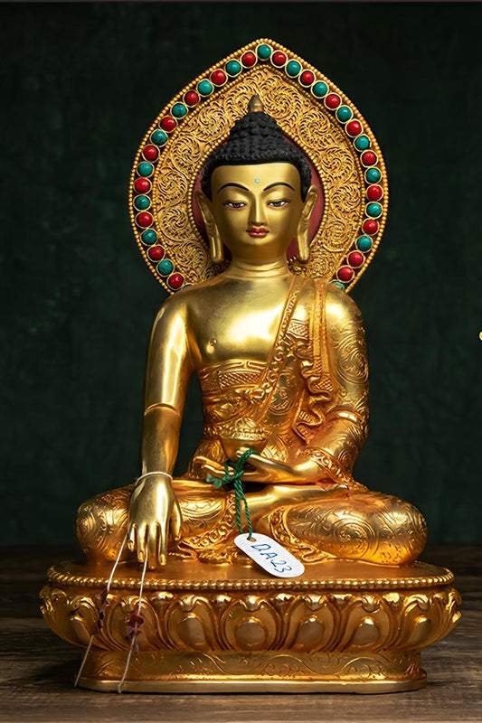 Handmade Tibetan-buddhist Shakyamuni Buddha statue in copper with mineral pigments, Tibetan Buddha art for meditation and spiritual inspiration.