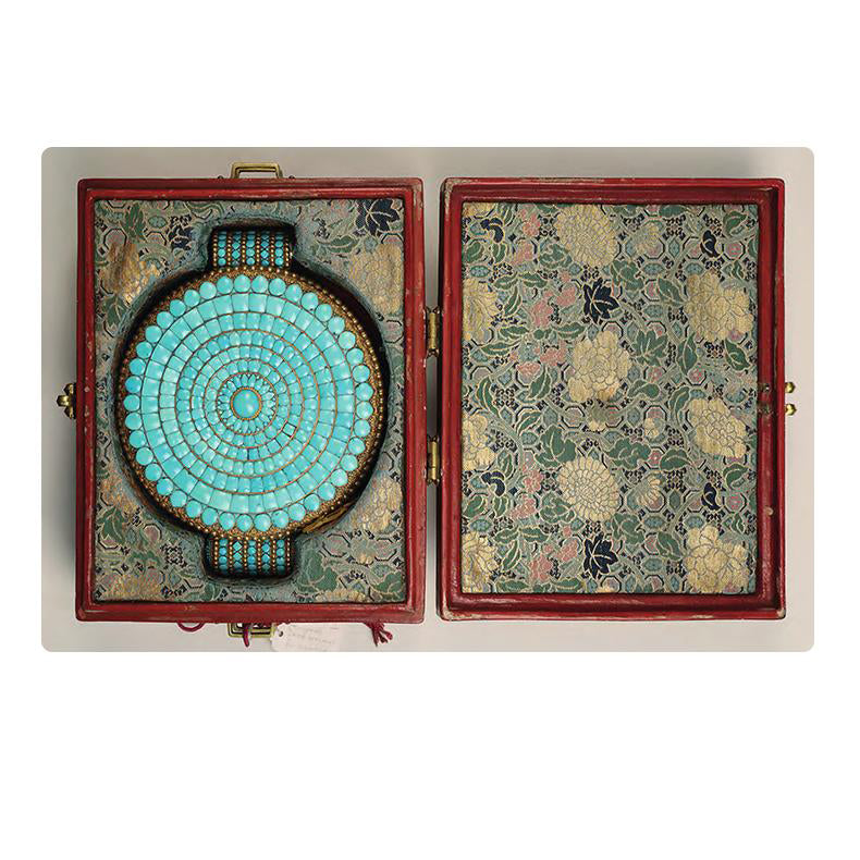 Tibetan Buddhist jewelry featuring turquoise, red agate, and agarwood beads for spiritual grounding and balance.