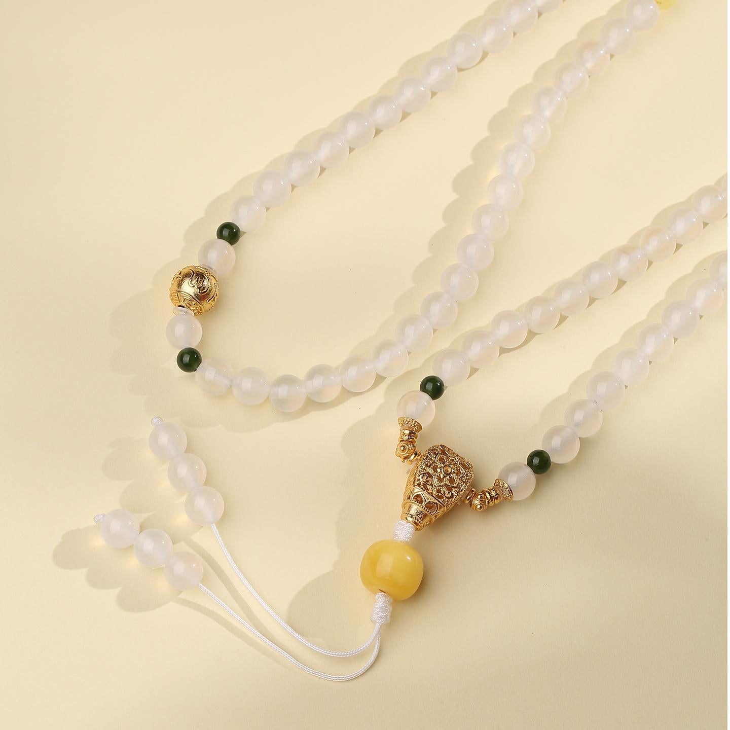 Tibetan-Buddhist mala necklace featuring agate, amber, jadeite, and 925 silver Vajra details, spiritual meditation jewelry