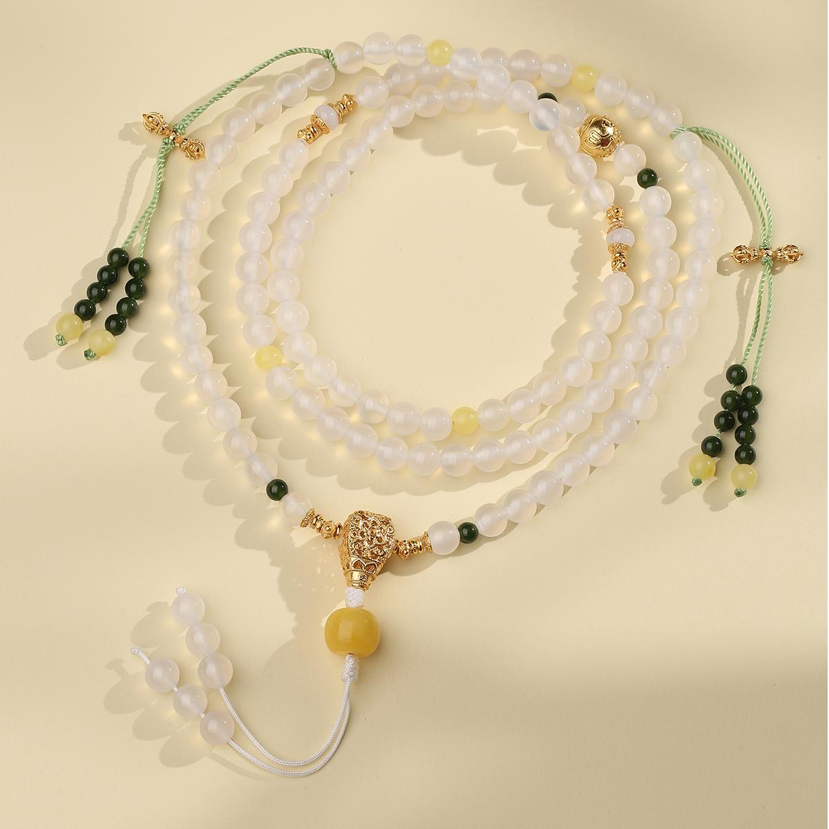 Tibetan-Buddhist agate and amber mala necklace with jade, jadeite, and silver spacers, handcrafted 108-bead meditation jewelry