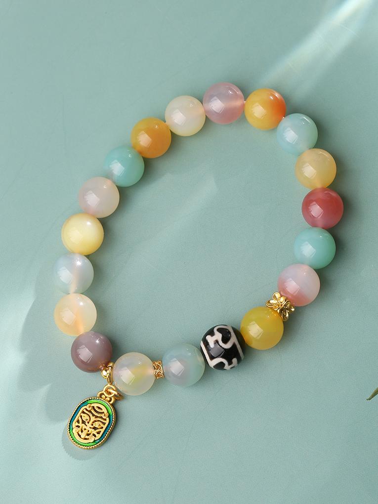 Tibetan-Buddhist agate bracelet featuring a Dzi-style bottle bead and copper elements