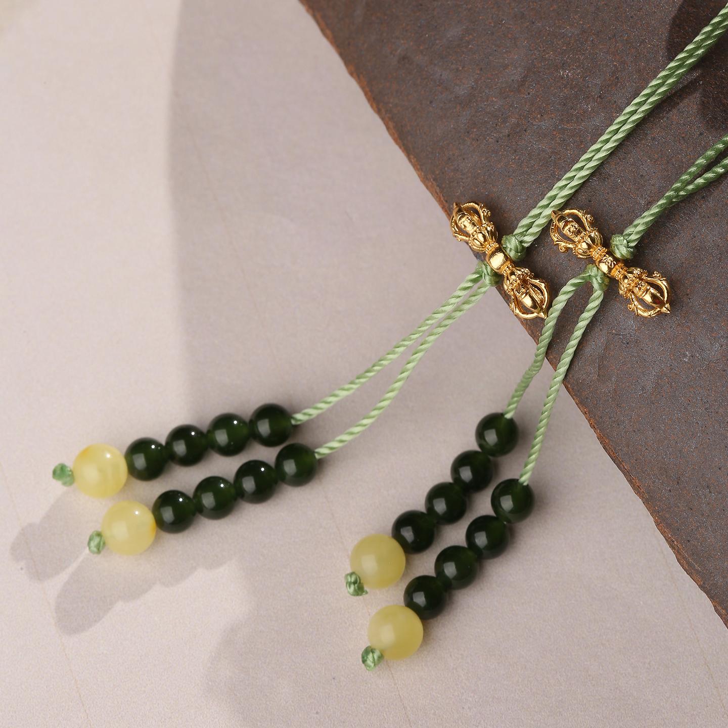 Tibetan prayer beads combining amber and agate with 925 silver Vajra and guru bead, symbolizing protection and clarity