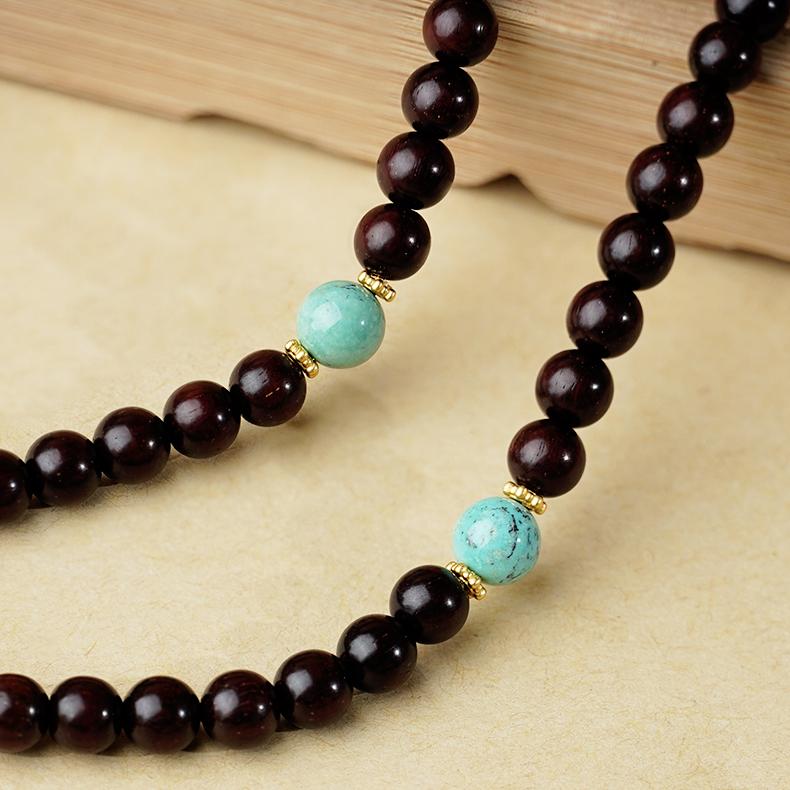 Handcrafted Dzi bead mala necklace made of red sandalwood, agate, and silver