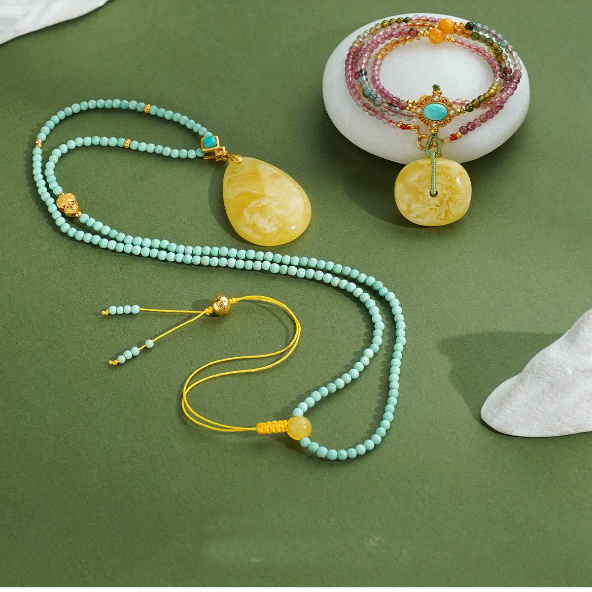 Elegant Tibetan Buddhist amber necklace with tourmaline and turquoise, handmade for spiritual harmony.