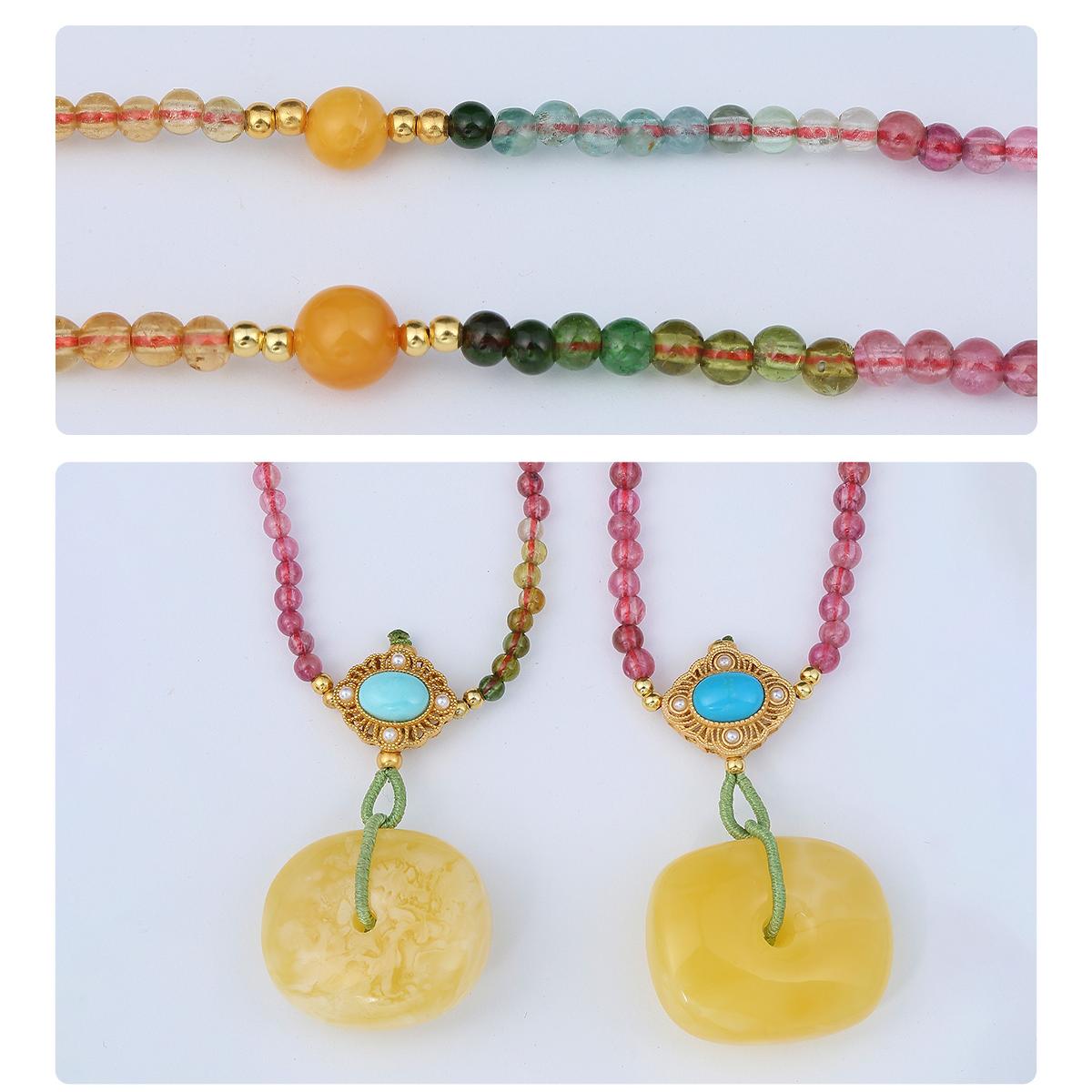 Handmade amber pendant in Tibetan style with 925 silver and turquoise settings, representing peace and abundance.