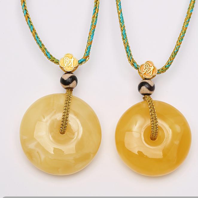 Tibetan Buddhist amber and tiger tooth amulet necklace, traditional jewelry for protection and good fortune