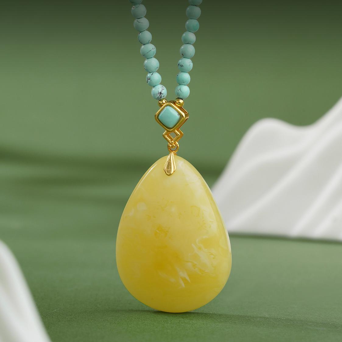 Artisan Tibetan Buddhist amber jewelry with 925 silver and turquoise, reflecting mindful craftsmanship.