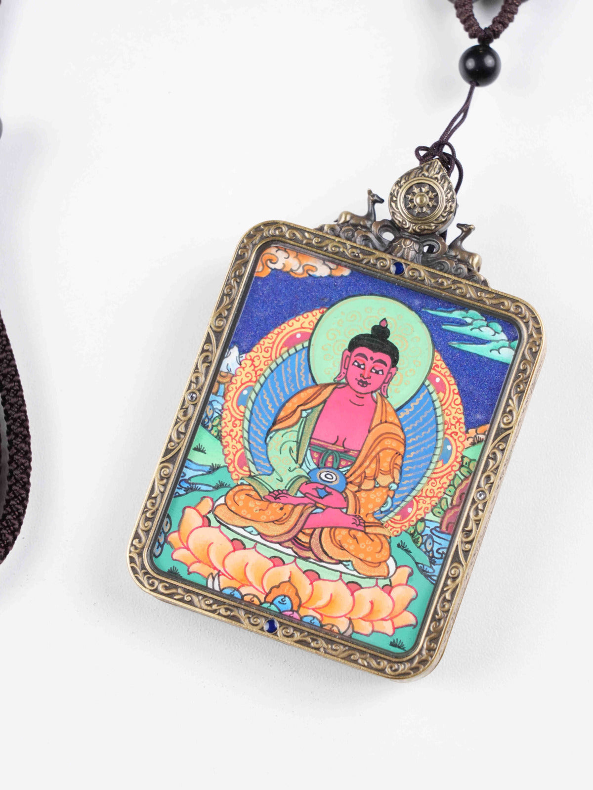Authentic Tibetan Thangka pendant of Amitabha Buddha for compassion and clarity.