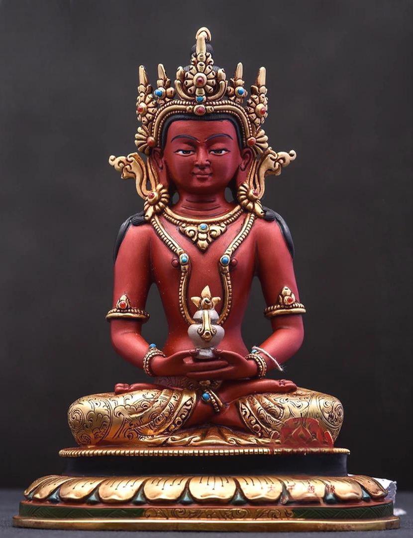 Handcrafted Tibetan Buddhist Longevity Buddha statue made of gilded brass, featuring fine Buddhist art and traditional craftsmanship.