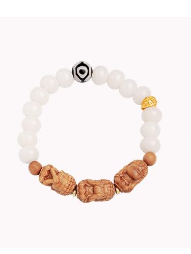Anru Bodhi seed bracelet inspired by Tibetan-Buddhist culture, featuring silver accents and symbolic Dzi bead for mindfulness