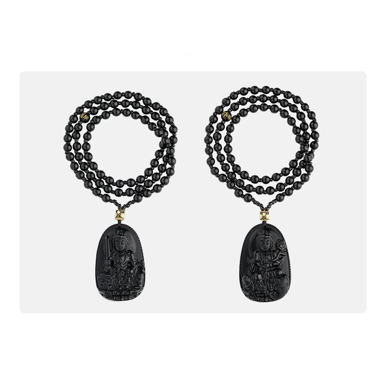 Handmade Tibetan-Buddhist obsidian necklace with copper beads symbolizing wealth and protection.