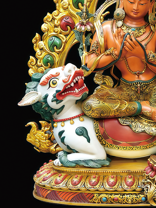 Detailed view of mineral pigment painting on a Manjushri statue, showcasing authentic Tibetan Buddhist statues craftsmanship.