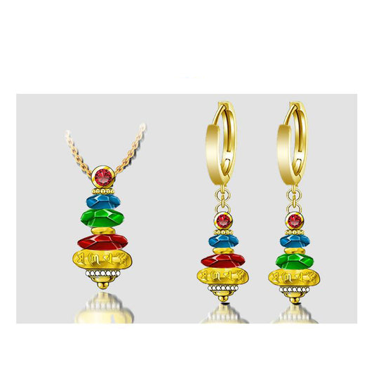 Tibetan Buddhist pearl and silver earrings representing spiritual balance and timeless beauty.