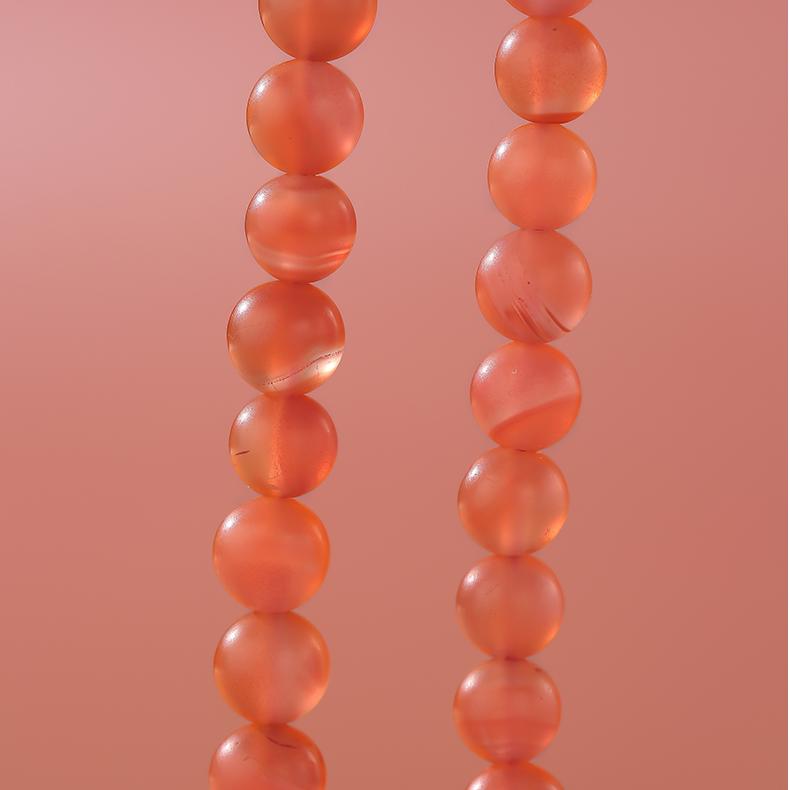 Tibetan Buddhist necklace featuring natural Red Agate, Lapis Lazuli, and White Jade stones for protection and balance.