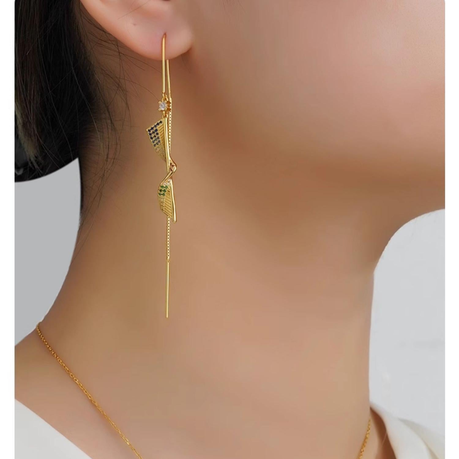 Tibetan Buddhist handcrafted silver earrings inspired by Ruyi for elegance and blessings.