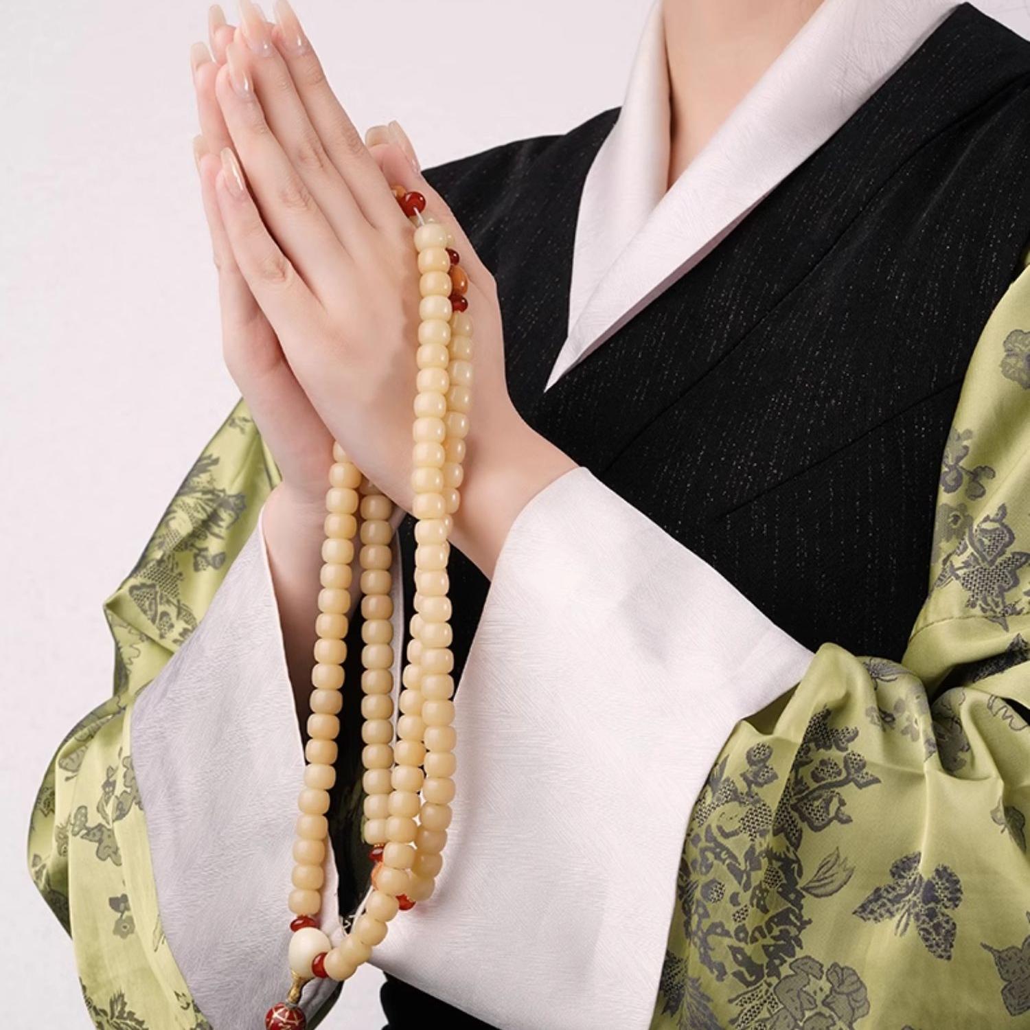 Tibetan Buddhist Bodhi and monkey head bead jewelry crafted with agate, copper and 925 silver in a spiritual artisan design.