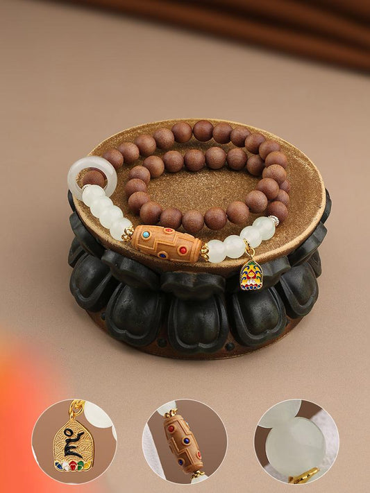 Tibetan-Buddhist Xiangmanjing Australian sandalwood multi-layer bracelet with Nine-Eye Dzi bead, handmade spiritual jewelry