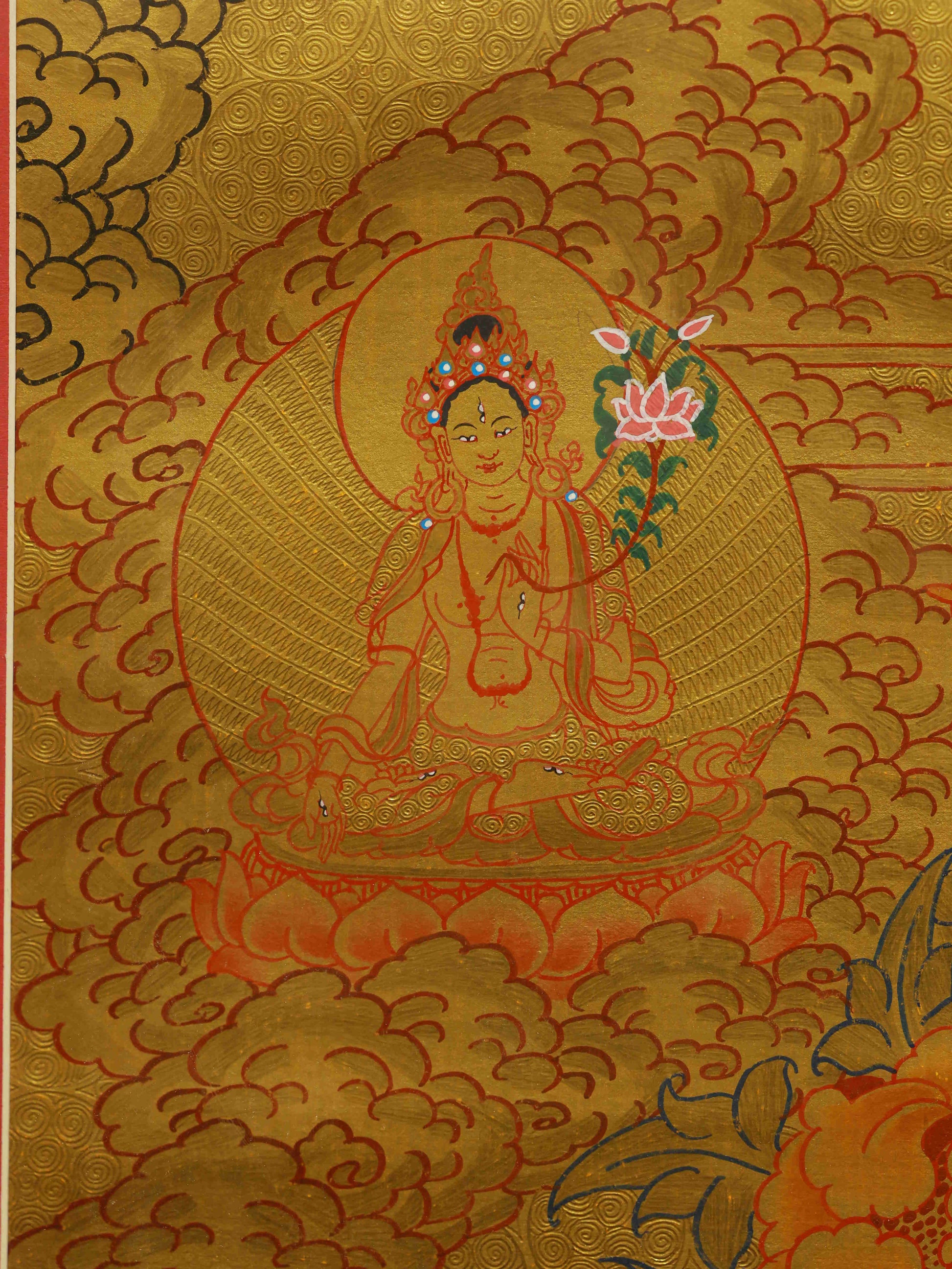 Handcrafted Avalokiteshvara Thangka using natural mineral pigments on Tibetan canvas.