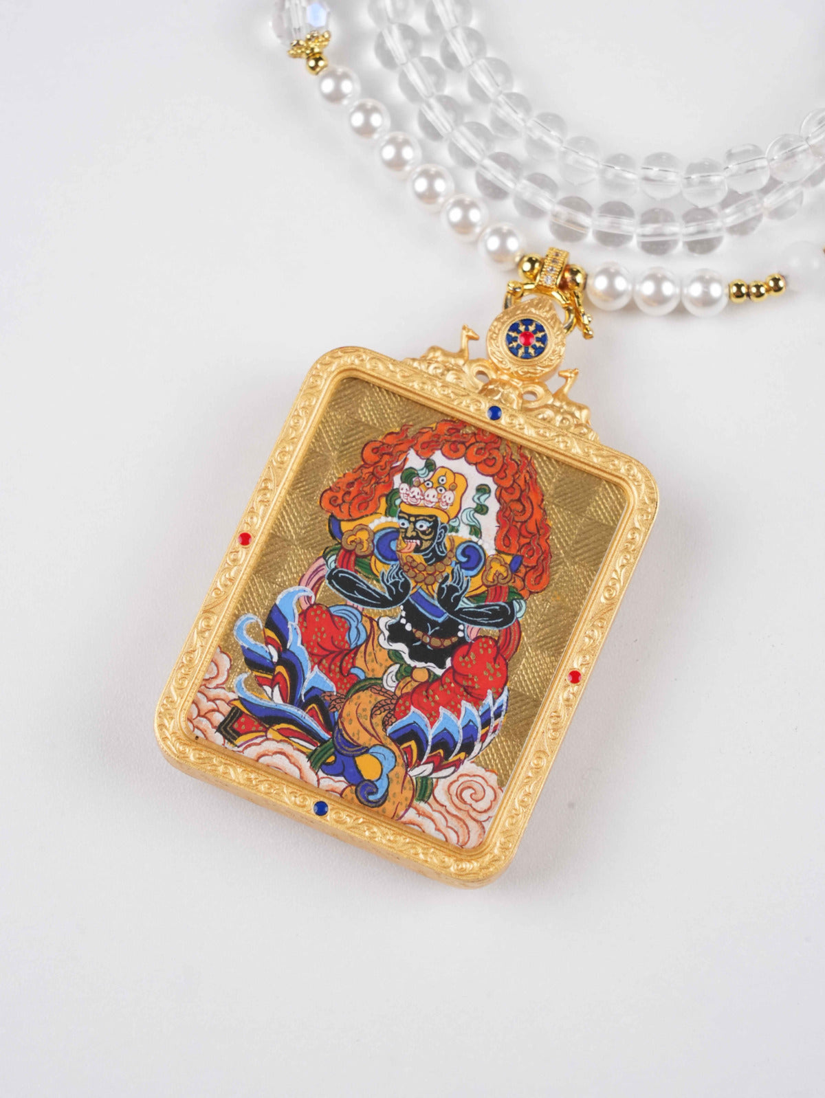 Black Dzambhala Protector Deity Pendant – handmade Tibetan thangka painting bringing abundance, protection, and spiritual power.