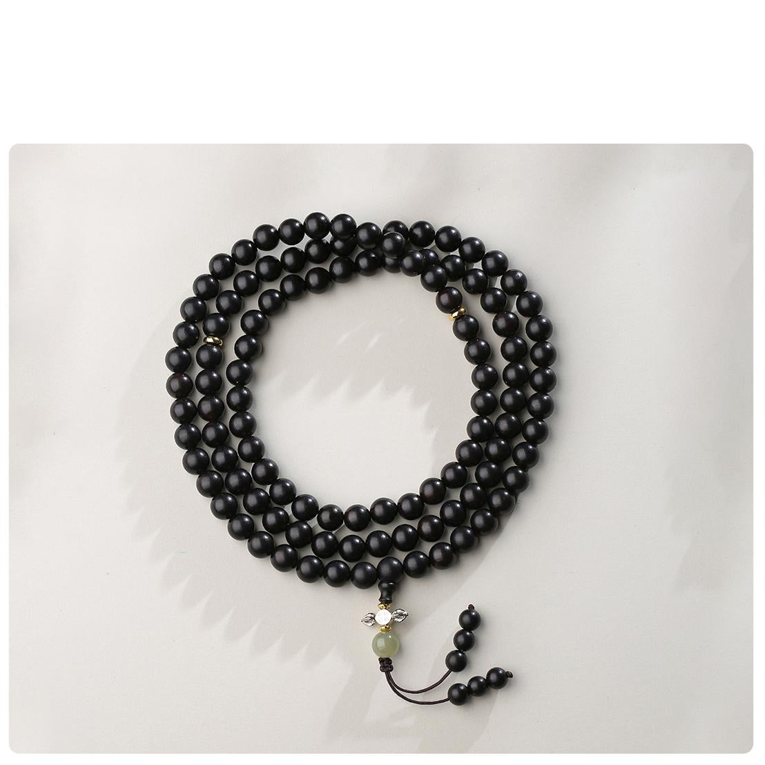 Artisanal Tibetan Buddhist ebony mala beads for meditation and protection