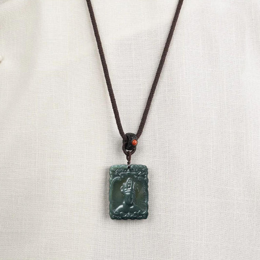 Handmade Potala Palace inspired Hetian jade pendant representing peace, prosperity, and devotion.