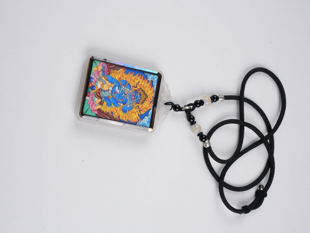 Black Jambhala thangka pendant with mineral pigments - authentic hand-painted craftsmanship