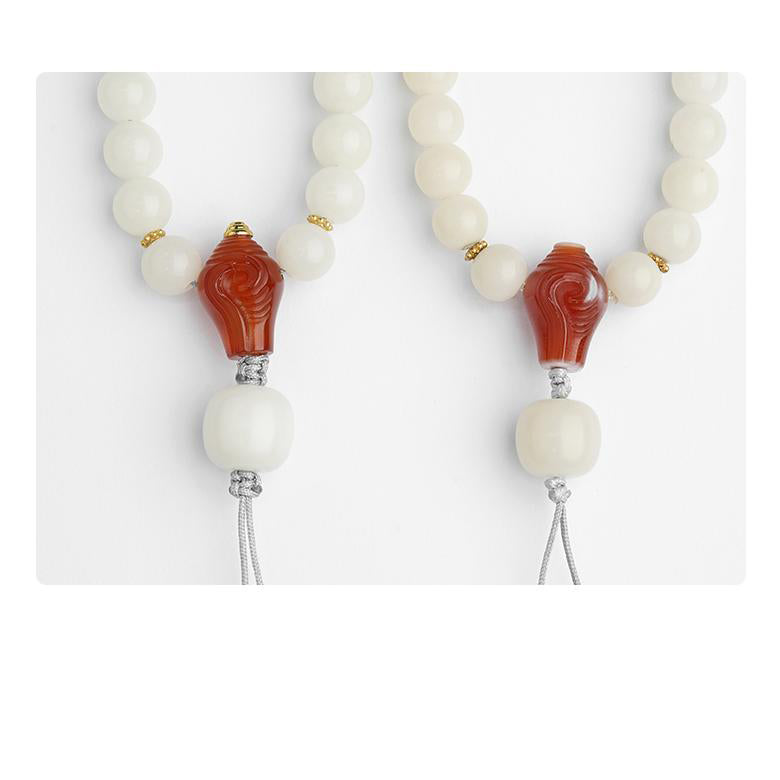 Artisan Tibetan bodhi and agate bead string with 925 silver charm for meditation.