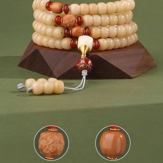 Handmade Tibetan Buddhist Bodhi bead necklace from the Jingqingran collection featuring agate, glass, and silver accents.