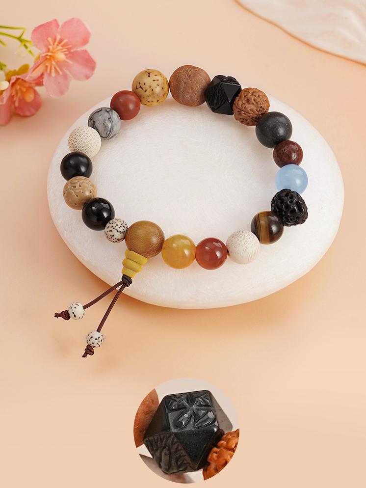 Artisanal Bodhi Eighteen Beads bracelet with obsidian, agate, and mixed gemstones, handmade for meditation.