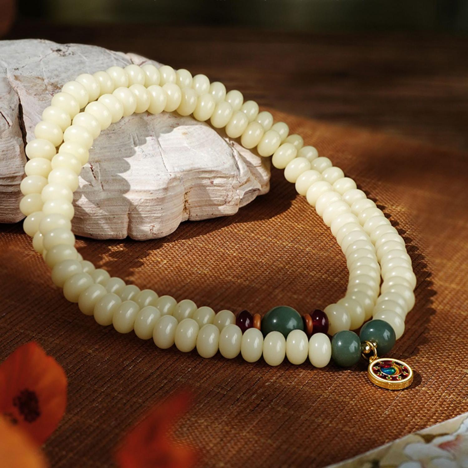 Handmade Bodhi 108 mala Yunshui Jing featuring agate 8x4mm beads and alloy spinning charm.